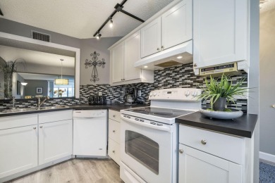 Welcome home to this updated first floor 2 BR/2 BA condo with on Boca Dunes Golf and Country Club in Florida - for sale on GolfHomes.com, golf home, golf lot
