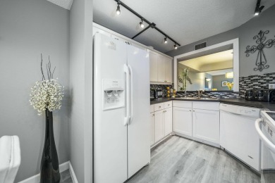 Welcome home to this updated first floor 2 BR/2 BA condo with on Boca Dunes Golf and Country Club in Florida - for sale on GolfHomes.com, golf home, golf lot