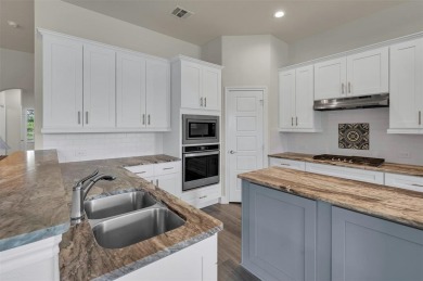 Beautiful home in Talon Hills located on a greenbelt! Recent on Eagle Mountain Country Club  in Texas - for sale on GolfHomes.com, golf home, golf lot