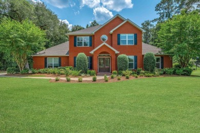 Welcome to this stunning 5-bedroom, 4.5-bathroom completely on Golden Eagle Country Club in Florida - for sale on GolfHomes.com, golf home, golf lot