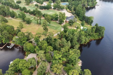 LAKEFRONT COTTAGE IN THE PINES – SPRING CREEK COUNTRY CLUB! on Spring Creek Country Club in Texas - for sale on GolfHomes.com, golf home, golf lot