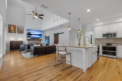 Welcome to this stunning 5-bedroom, 4.5-bathroom completely on Golden Eagle Country Club in Florida - for sale on GolfHomes.com, golf home, golf lot