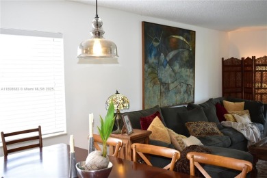 Large 1st Floor corner unit.  Privateplete impact glass on Sunrise Lakes Phase III in Florida - for sale on GolfHomes.com, golf home, golf lot
