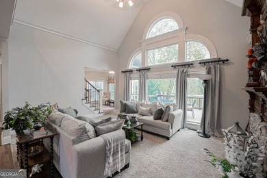 Experience refined living at 1041 Windermere Crossing an elegant on Windermere Golf Club in Georgia - for sale on GolfHomes.com, golf home, golf lot