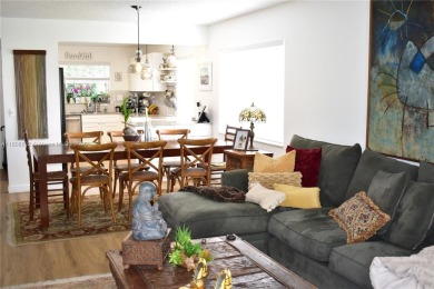 Large 1st Floor corner unit.  Privateplete impact glass on Sunrise Lakes Phase III in Florida - for sale on GolfHomes.com, golf home, golf lot