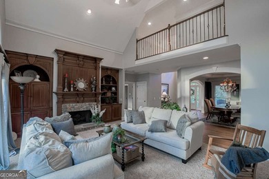 Experience refined living at 1041 Windermere Crossing an elegant on Windermere Golf Club in Georgia - for sale on GolfHomes.com, golf home, golf lot