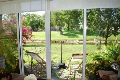 Large 1st Floor corner unit.  Privateplete impact glass on Sunrise Lakes Phase III in Florida - for sale on GolfHomes.com, golf home, golf lot