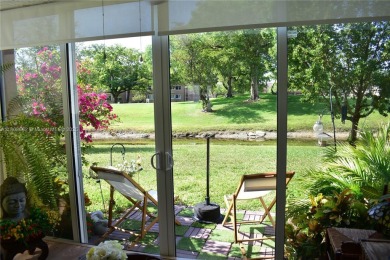 Large 1st Floor corner unit.  Privateplete impact glass on Sunrise Lakes Phase III in Florida - for sale on GolfHomes.com, golf home, golf lot