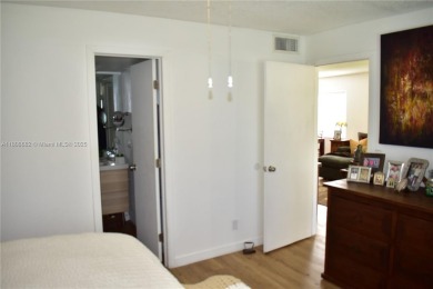 Large 1st Floor corner unit.  Privateplete impact glass on Sunrise Lakes Phase III in Florida - for sale on GolfHomes.com, golf home, golf lot