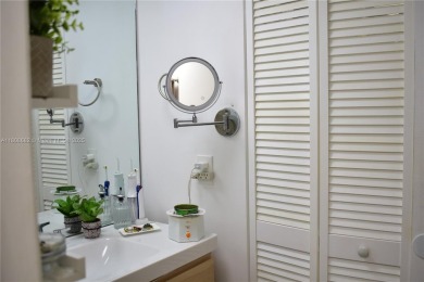 Large 1st Floor corner unit.  Privateplete impact glass on Sunrise Lakes Phase III in Florida - for sale on GolfHomes.com, golf home, golf lot