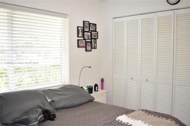 Large 1st Floor corner unit.  Privateplete impact glass on Sunrise Lakes Phase III in Florida - for sale on GolfHomes.com, golf home, golf lot