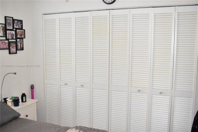 Large 1st Floor corner unit.  Privateplete impact glass on Sunrise Lakes Phase III in Florida - for sale on GolfHomes.com, golf home, golf lot