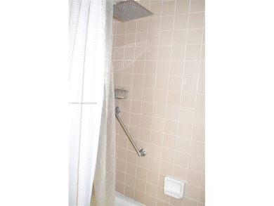Large 1st Floor corner unit.  Privateplete impact glass on Sunrise Lakes Phase III in Florida - for sale on GolfHomes.com, golf home, golf lot