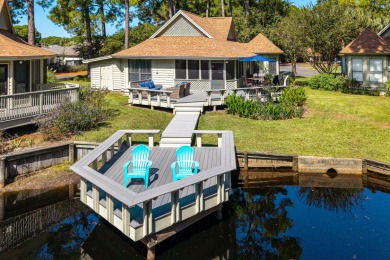 Nestled on the pond in the sought-after Fairways community of on Sandestin Golf and Beach Resort - The Links in Florida - for sale on GolfHomes.com, golf home, golf lot