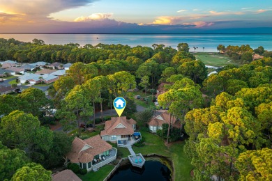 Nestled on the pond in the sought-after Fairways community of on Sandestin Golf and Beach Resort - The Links in Florida - for sale on GolfHomes.com, golf home, golf lot