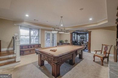 Experience refined living at 1041 Windermere Crossing an elegant on Windermere Golf Club in Georgia - for sale on GolfHomes.com, golf home, golf lot