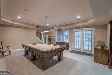 Experience refined living at 1041 Windermere Crossing an elegant on Windermere Golf Club in Georgia - for sale on GolfHomes.com, golf home, golf lot