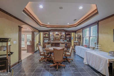Experience refined living at 1041 Windermere Crossing an elegant on Windermere Golf Club in Georgia - for sale on GolfHomes.com, golf home, golf lot