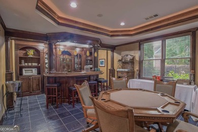 Experience refined living at 1041 Windermere Crossing an elegant on Windermere Golf Club in Georgia - for sale on GolfHomes.com, golf home, golf lot