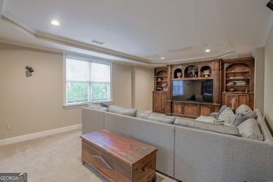 Experience refined living at 1041 Windermere Crossing an elegant on Windermere Golf Club in Georgia - for sale on GolfHomes.com, golf home, golf lot