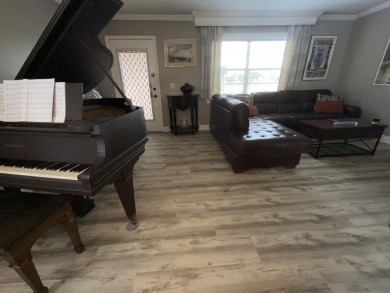 FURNISHED TURNKEY WITH A MASON & HAMLIN GRAND PIANO  in the on Kings Point Golf -Flanders Way in Florida - for sale on GolfHomes.com, golf home, golf lot
