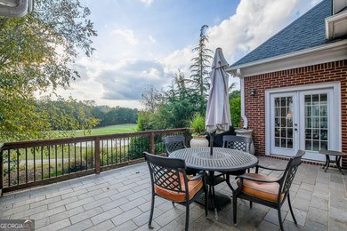 Experience refined living at 1041 Windermere Crossing an elegant on Windermere Golf Club in Georgia - for sale on GolfHomes.com, golf home, golf lot