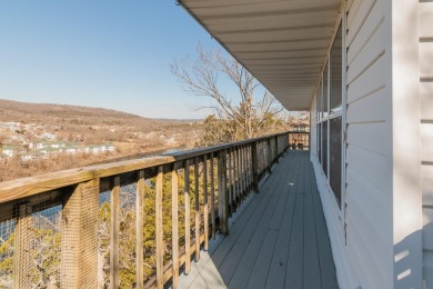 Lakefront with a view of Lake Taneycomo, facing west toward the on Pointe Royale Village Country Club in Missouri - for sale on GolfHomes.com, golf home, golf lot