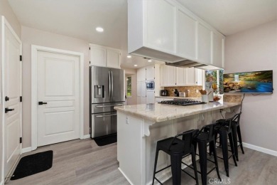 Welcome to this beautifully updated 3-bedroom, 2-bath on Spring Valley Lake Country Club in California - for sale on GolfHomes.com, golf home, golf lot