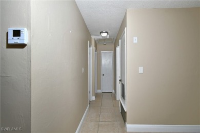 This Florida-style 2 BR/1 Bath condo in Golf wood I is the on Lehigh Resort Club in Florida - for sale on GolfHomes.com, golf home, golf lot