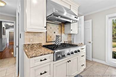 This Forest Lakes gem at 1109 Offshore Drive offers expansive on Highland Country Club in North Carolina - for sale on GolfHomes.com, golf home, golf lot