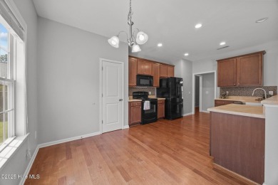 Hard floors throughout the home, vaulted ceilings and a huge on Belvedere Country Club in North Carolina - for sale on GolfHomes.com, golf home, golf lot