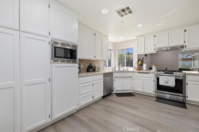 Welcome to this beautifully updated 3-bedroom, 2-bath on Spring Valley Lake Country Club in California - for sale on GolfHomes.com, golf home, golf lot