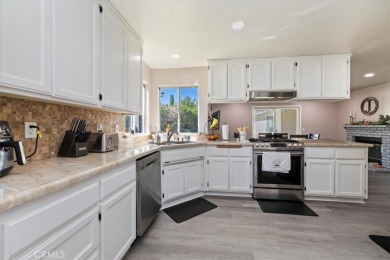 Welcome to this beautifully updated 3-bedroom, 2-bath on Spring Valley Lake Country Club in California - for sale on GolfHomes.com, golf home, golf lot