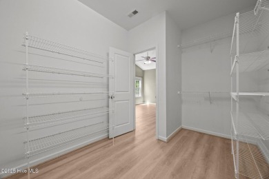 Hard floors throughout the home, vaulted ceilings and a huge on Belvedere Country Club in North Carolina - for sale on GolfHomes.com, golf home, golf lot