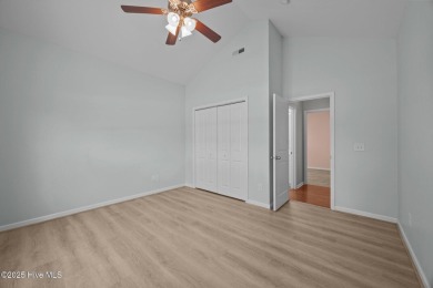 Hard floors throughout the home, vaulted ceilings and a huge on Belvedere Country Club in North Carolina - for sale on GolfHomes.com, golf home, golf lot