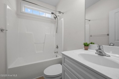 Hard floors throughout the home, vaulted ceilings and a huge on Belvedere Country Club in North Carolina - for sale on GolfHomes.com, golf home, golf lot