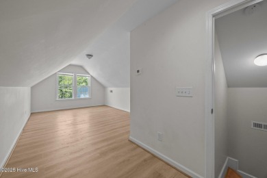 Hard floors throughout the home, vaulted ceilings and a huge on Belvedere Country Club in North Carolina - for sale on GolfHomes.com, golf home, golf lot