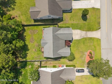 Hard floors throughout the home, vaulted ceilings and a huge on Belvedere Country Club in North Carolina - for sale on GolfHomes.com, golf home, golf lot
