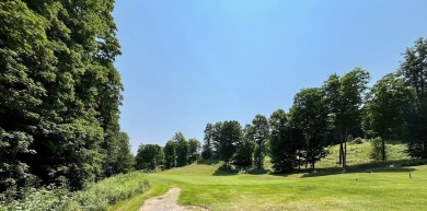 Lot 60 Sparrow Hawk Drive is located on the 12th green of the on The Chief Golf Course in Michigan - for sale on GolfHomes.com, golf home, golf lot