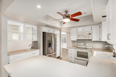 Enjoy the best of the Palo Verde golf community in this freshly on Palo Verde Golf and Country Club in Arizona - for sale on GolfHomes.com, golf home, golf lot