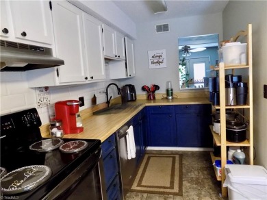 Discover this charming 2 bedroom, one and a half bathroom condo on Heather Hills Golf Course in North Carolina - for sale on GolfHomes.com, golf home, golf lot