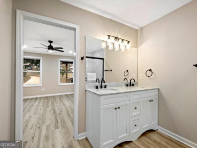 Exceptionally Renovated Four-Sided Brick Ranch On A Quiet Street on East Lake Golf Club in Georgia - for sale on GolfHomes.com, golf home, golf lot