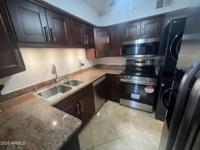 This spacious upper level condo gets tons of light, has a new on Arizona Biltmore Golf and Country Club in Arizona - for sale on GolfHomes.com, golf home, golf lot