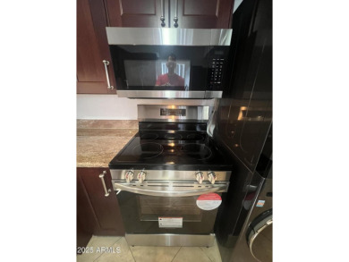 This spacious upper level condo gets tons of light, has a new on Arizona Biltmore Golf and Country Club in Arizona - for sale on GolfHomes.com, golf home, golf lot