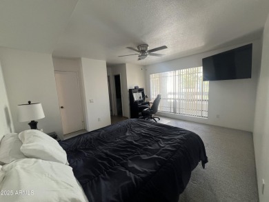 This spacious upper level condo gets tons of light, has a new on Arizona Biltmore Golf and Country Club in Arizona - for sale on GolfHomes.com, golf home, golf lot
