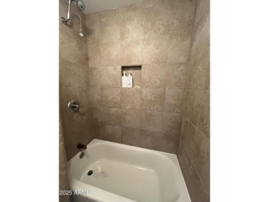 This spacious upper level condo gets tons of light, has a new on Arizona Biltmore Golf and Country Club in Arizona - for sale on GolfHomes.com, golf home, golf lot