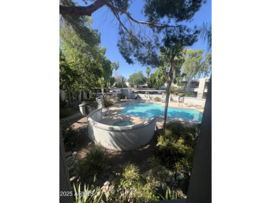 This spacious upper level condo gets tons of light, has a new on Arizona Biltmore Golf and Country Club in Arizona - for sale on GolfHomes.com, golf home, golf lot