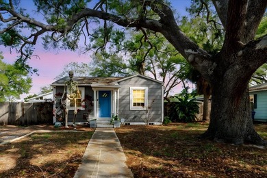 Tucked beneath the shade of mature trees in the beloved Edgemoor on Mangrove Bay Golf Course in Florida - for sale on GolfHomes.com, golf home, golf lot