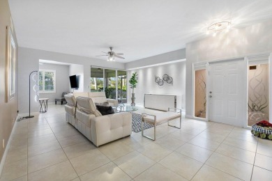 Gorgeous ground-level condominium boasting picturesque LAKE and on Polo Club of Boca Raton in Florida - for sale on GolfHomes.com, golf home, golf lot
