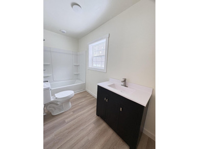 This charming Lakes of the North home has been fully renovated on Lakes of the North Deer Run Golf Course in Michigan - for sale on GolfHomes.com, golf home, golf lot